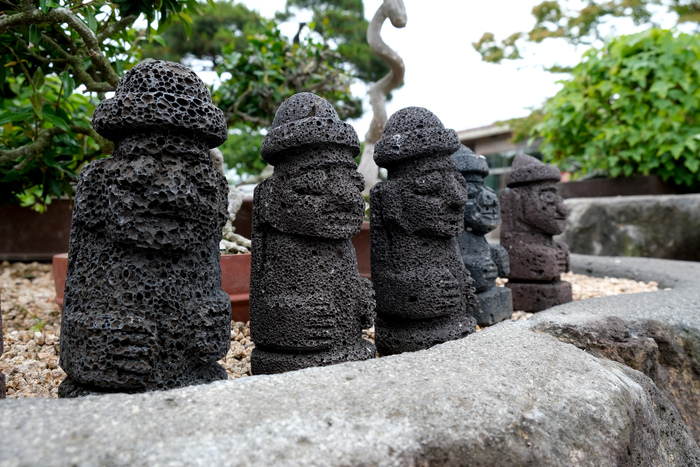 Dol Hareubang in a Jeju Garden